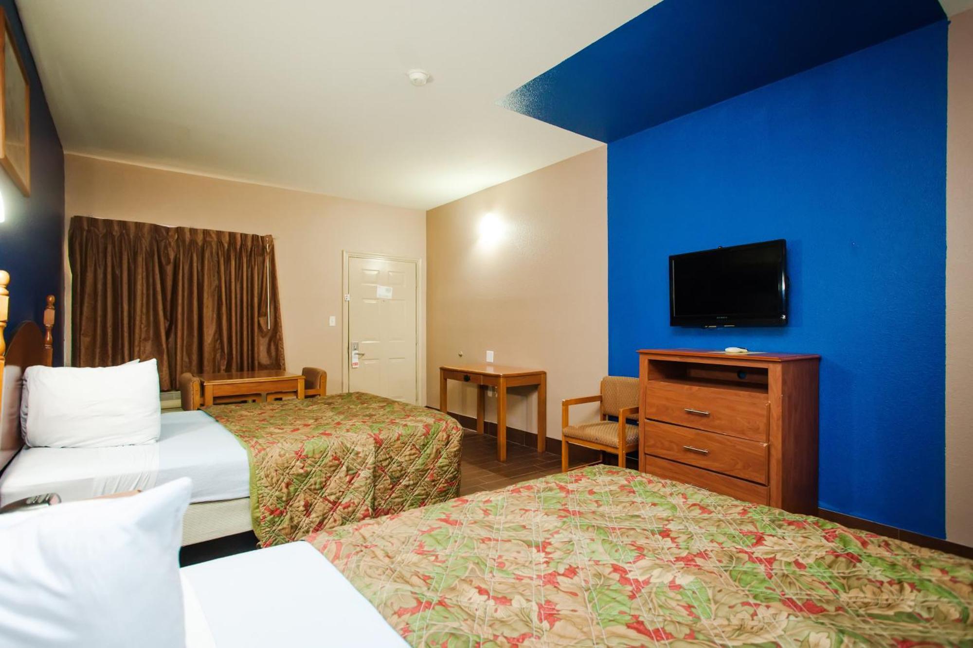 Scottish Inn & Suites Hankamer Zimmer foto